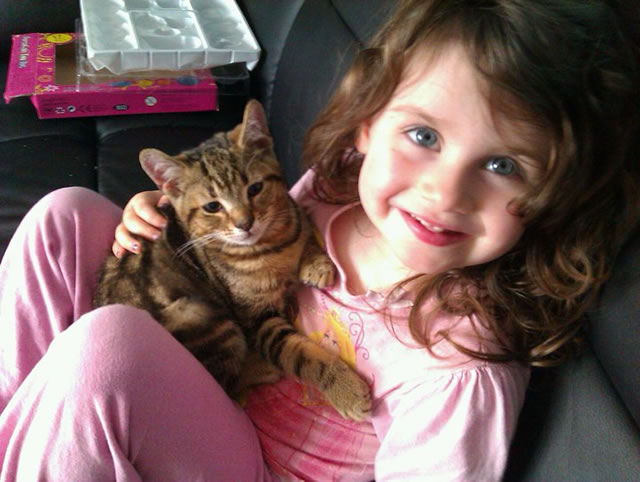 Kennerleigh with a kitten.