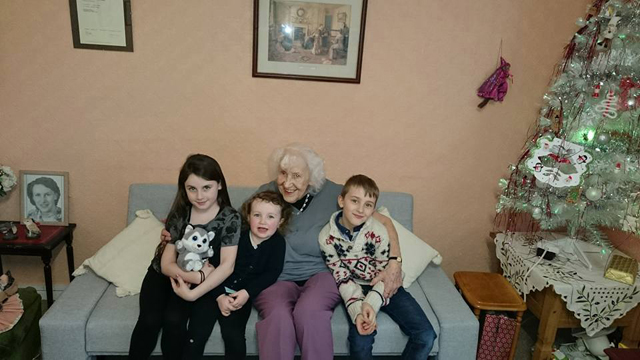 Gisela spending Christmas 2016 with her great-grandchildren.