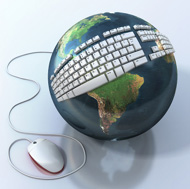 Keyboard with mouse attached to a Global Earth.