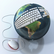 Keyboard with mouse attached to a Global Earth.